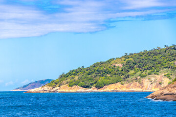 Naklejka premium Tropical Urca Red Beach Rocks Water Rio de Janeiro Brazil.