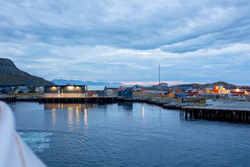 Naklejka premium Family with kids and dog, traveling with ferry from Moskenesoya to Varoya with pet dog, dog in backpack