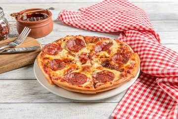 Spiced Pepperoni Pizza With Napkin