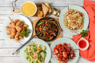 Delicious Array of Asian Cuisine Served at a Table