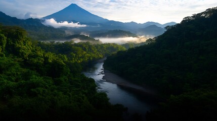 Serene Sunrise over Lush Rainforest and Majestic Volcano