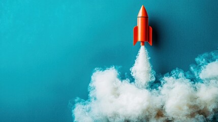 A red and orange rocket ship flying through a blue sky with white clouds.