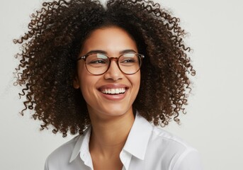Happy Young Woman with Curly Hair and Glasses isolated on white background