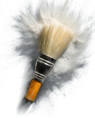 A wooden-handled brush explodes with white powder, creating a dramatic, artistic effect.