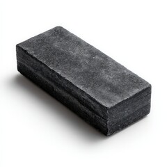 Dark gray rectangular stone block on white background.