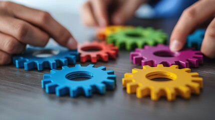 Obraz premium Colorful Gears for Creative Problem Solving and Team Collaboration