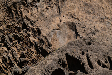 Background of eroded rock surface displaying unique patterns