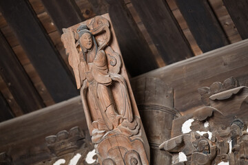 Intricate Wood Carving in Ancient Architecture
