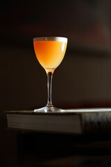 Classic cocktail glass in a nightclub restaurant, close-up