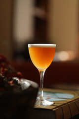 Classic cocktail glass in a nightclub restaurant, close-up