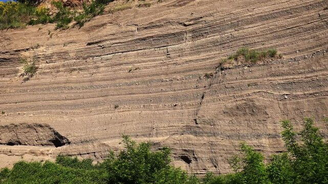 Discover the geological layers of tuff, ash, and pyroclastic deposits at wingertbergwand near laacher see, showcasing volcanic history in cologne