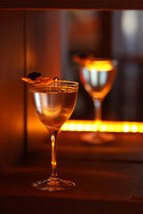 Modern Cocktail with Unique Garnish on a Bar Counter