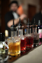 Liqueur Bottles on a Bar Counter, close-up