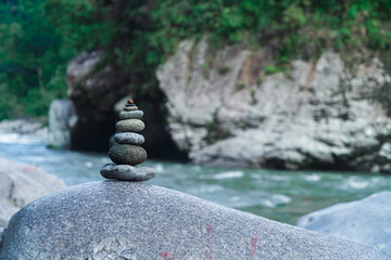 Figures of river stones