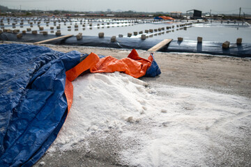 Sea salt collected and piled after full evaporation cycle in Vietnam village. Traditional method...