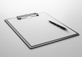Blank clipboard with pen on smooth surface for note taking  