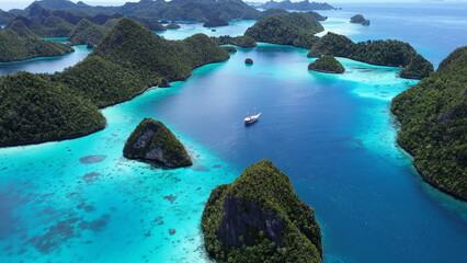 Remote lagoon at Wayag island consisting of limestone islands, Raja Ampat, West Papua, Indonesia