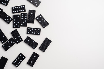 Domino on light background. Domino effect concept. Business, risk, management and finance concept