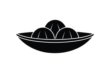Three limes in a silhouette boat shaped bowl
