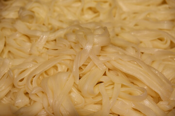 wide noodles food close up