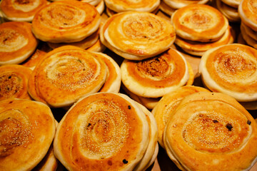 Stacks of golden-brown sesame pancakes, Chinese food