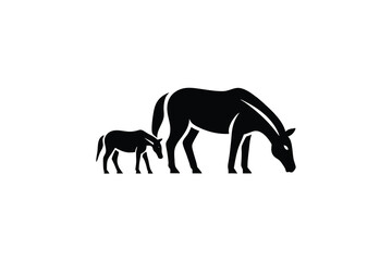 Majestic horse and foal silhouette grazing together