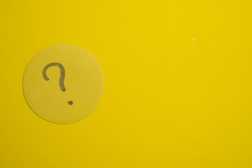 Question mark isolated on yellow background. Problem solving