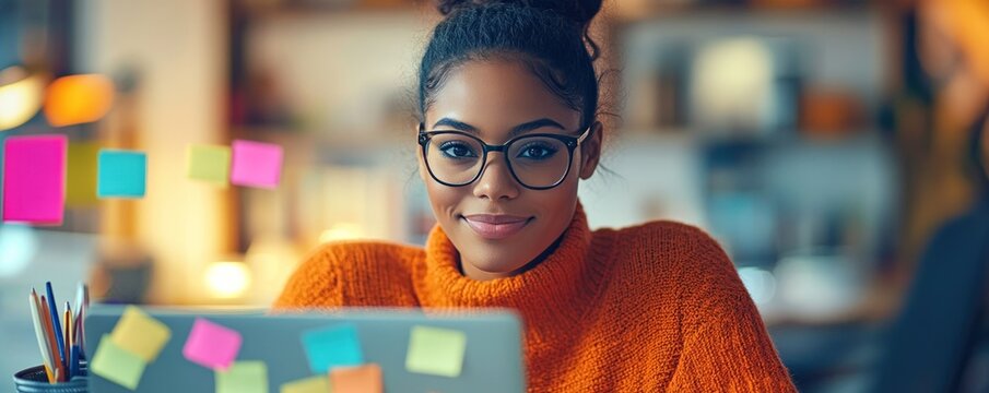 Focused young woman working on a laptop