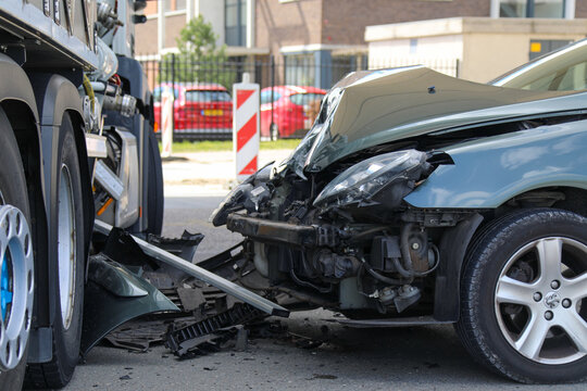 a car crashed into a truck