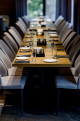 Table setting. Close-up photo of empty glasses, plates and spoons