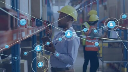 Warehouse worker scanning barcodes in aisle generating blue icons building inventory data mesh - Powered by Adobe