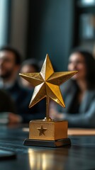 Golden star award shines at awards ceremony with attendees in background