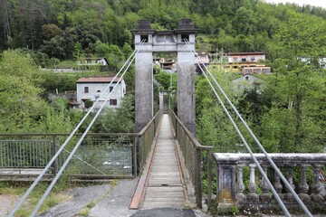 Lima Bridge in Bagni di Lucca. Historic footbridge built in 1921 in Bagni di Lucca, Tuscany, Italy.