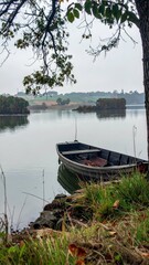 Tranquil Scene Featuring a Boat on Calm Waters with Negative Space