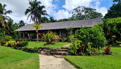 Lush Tropical Farmhouse Surrounded by Aromatic Spice Garden on Island