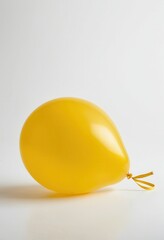 Bright yellow balloon, perfect for celebrations and fun parties.