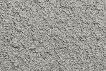 Fototapeta premium A close-up texture of gray stucco, showcasing its rough surface and intricate patterns. Perfect for backgrounds, design projects, or architectural themes in various applications.