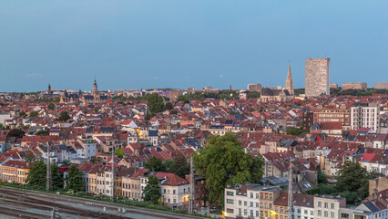 Aerial day to night timelapse panorama over Brussels skyline in Schaerbeek with Saint-Servais...