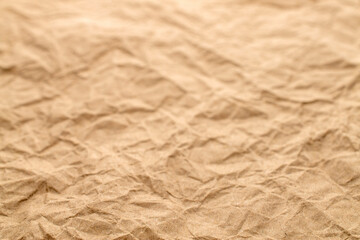 Texture of crumpled kraft paper, macro.