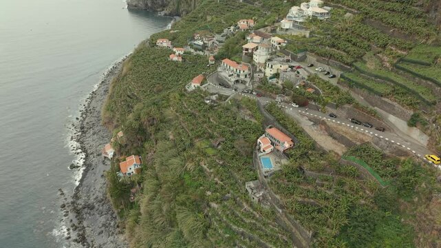 Madeira fly over at south atlantic coast with the Anjos Waterfall landscape