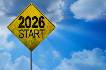 Road signs indicate the path to the new year 2026 and the old year 2025 on a blue sky, creative idea. Choose a new road, concept. Change for the better