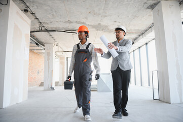 Diverse team collaborating on modern construction project