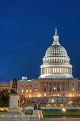 The illuminated United States Capitol in Washington DC at night