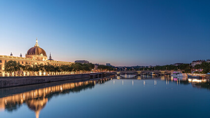 Fototapeta premium The Grand Hotel-Dieu Day to night transition timelapse hyperlapse in Lyon, France.