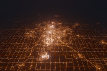 Aerial view on Lansing (USA) from west. Top view on modern city at night from satellite