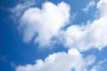 Obraz premium White dreamy Clouds on a bright blue sky on a sunny day