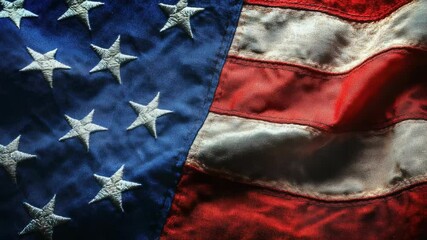 A close-up view of the American flag featuring its iconic stars - Powered by Adobe
