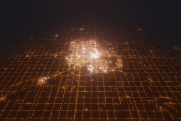 Aerial view on Lincoln (USA) from north. Top view on modern city at night from space