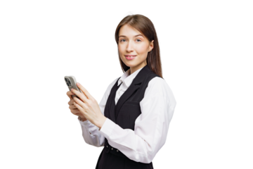 Professional young woman engaging with smartphone in a bright studio during a business workday