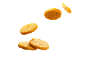 Floating golden brown disks with a black background creating a simple yet visually appealing image scene on transparent background